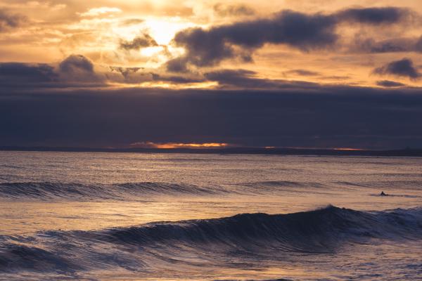 Winter Surfers and Sunset at Lawrencetown Beach